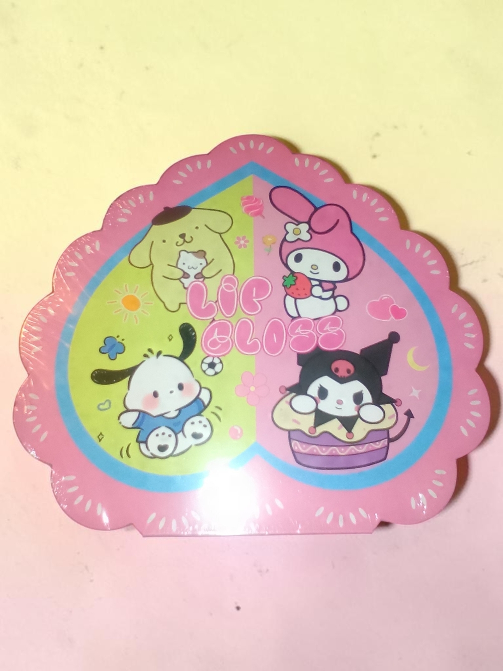 Sanrio Pink Scalloped Lip Gloss Compact with Pastel Character Art